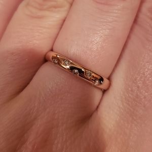 10K rose gold diamond ring. Very cute on.